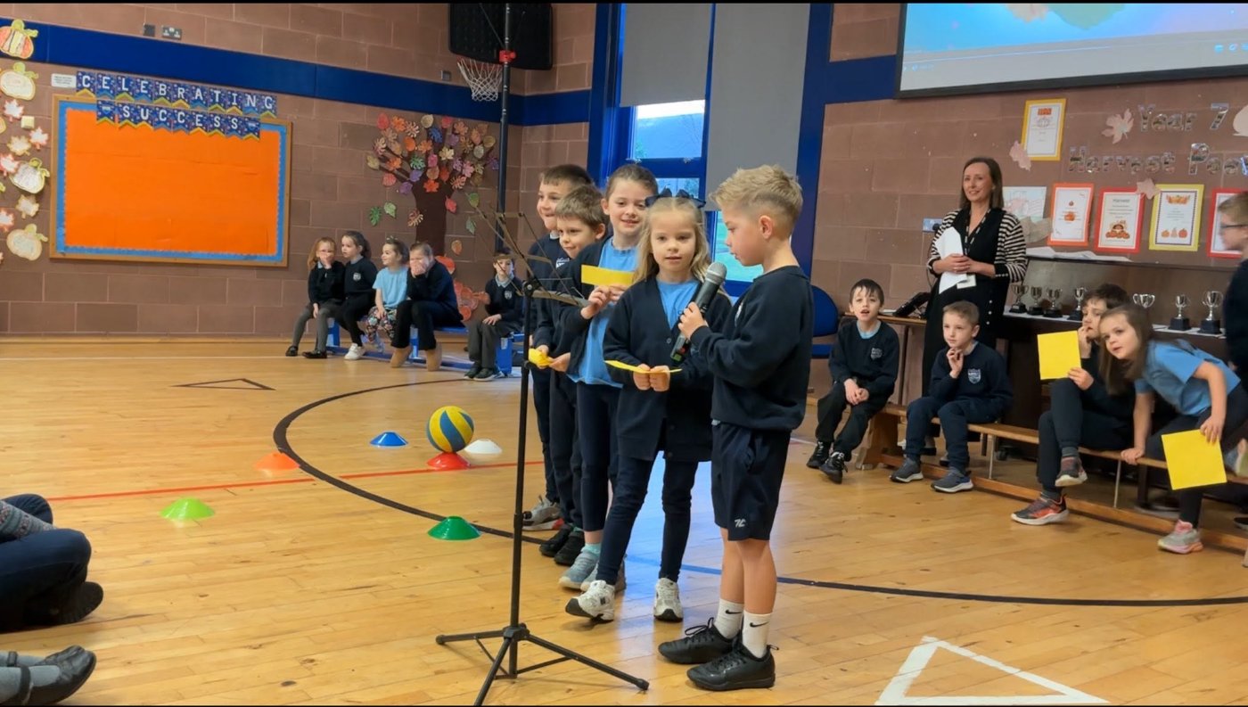 Pupils at a Carnalridge Primary School assembly, celebrating success